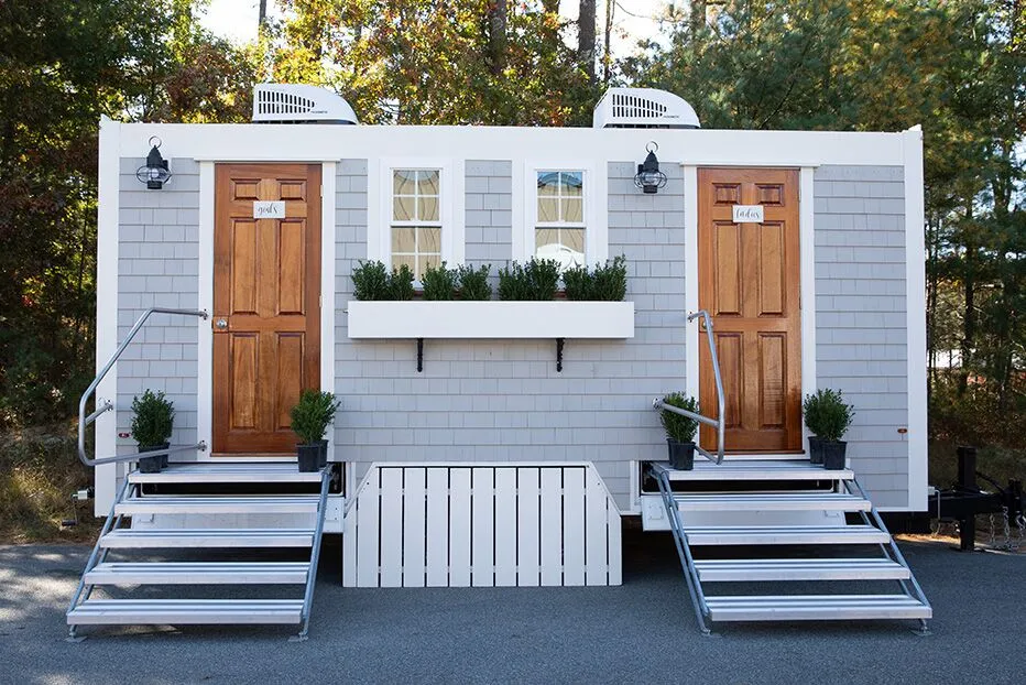 Deluxe flushable portable restroom unit with sink for upscale outdoor events